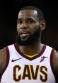 LeBron James passionately speaking during a Cleveland Cavaliers game, showcasing his intensity and leadership on the court.