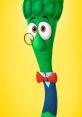 Cheerful Archibald Asparagus, a character from VeggieTales, featuring a bow tie and glasses against a bright yellow background.