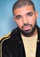 Drake poses confidently in a stylish black jacket, showcasing his signature look and charisma.