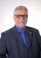 Luiz Carlos, known as Luizinho Leal, professional portrait in suit, showcasing leadership and expertise in his field.