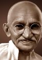 Mahatma Gandhi smiling with glasses, embodying peace and nonviolent resistance in a timeless portrait.