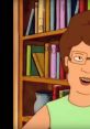 Peggy Hill smiling in a library, surrounded by colorful books, showcasing her love for learning and teaching in Arlen, Texas.