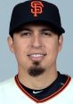 Ramida Penuka proudly sporting an SF Giants cap, showcasing his player spirit and team pride in a classic headshot.