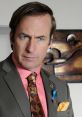 Saul Goodman, a skilled lawyer known for his flashy style, showcases a confident expression in a colorful suit.