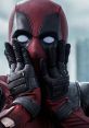 Deadpool XI with a dramatic expression, hands on face, showcasing the iconic red and black costume and mask.