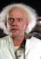 Doc Emmett Brown, played by Christopher Lloyd, with wild hair and surprised expression, in a sci-fi adventure scene.