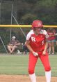 Excited Rustburg Softball player celebrating a big play, showcasing team spirit and determination on the field.