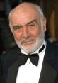 Sean Connery, renowned actor, sporting a classic tuxedo and bow tie, exudes charm at a prestigious event.