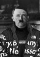 Portrait of Adolf Hitler in a modern jacket, blending historical and contemporary fashion styles.