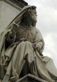 Marble statue of a bearded figure in robes, symbolizing wisdom and prophecy, reminiscent of the biblical Isaiah.