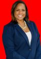 Tanisha Taylor wearing a navy blazer and statement necklace, smiling confidently against a bright red background.