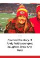 Cheerful fan at a football game, wearing a Chiefs hat, celebrating the excitement of the sport and family ties.