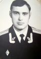 Formal portrait of a man in a military uniform, showcasing rank insignia and a serious expression. Historical context.