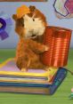 Guinea pig in a cap holds a can while sitting on colorful storybooks, reflecting the whimsical world of The Wonder Pets.