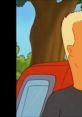 Boomhauer stands next to a red car, set against a backdrop of green trees and a clear blue sky, showcasing his iconic style.