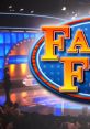 Colorful Family Feud stage with audience, featuring iconic logo and vibrant lighting creating an exciting game show atmosphere.