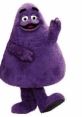 Grimace, the iconic purple McDonald's character, waves cheerfully in a playful pose. Fun and whimsical mascot representation.