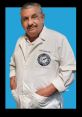 Dr. Aaron Fretes in a white coat, posing confidently against a bright blue background.