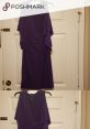 Draped purple dress on hanger, perfect for casual or elegant occasions. Shop Lauren Flurry styles on Poshmark today!