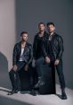 Three men in leather jackets pose stylishly, embodying the edgy aesthetic of FastBoy's latest fashion campaign.