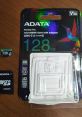 ADATA Premier Pro 128GB microSDXC card with adapter, UHS-I, Class 10, 4K Ultra HD, 100 MB/s speed.