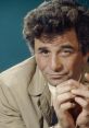 Columbo’s iconic look with his trademark trench coat, showcasing his signature charm and investigative demeanor.