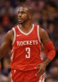 Chris Paul in a red Houston Rockets jersey, showcasing his skills during an intense NBA game with a basketball.