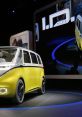 VW ID. Buzz showcased with vibrant yellow and modern design, featuring innovative technology and a spacious interior.