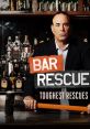 Jon Taffer from Bar Rescue poses with a sledgehammer, ready to tackle tough bar makeovers and help struggling businesses.