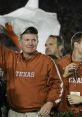 Texas Longhorns coach celebrating victory at the National Championship, showcasing team spirit and pride.