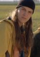 Jay's iconic look with long hair and beanie, embodying the spirit of "Jay and Silent Bob" in a vibrant outdoor setting.