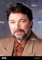 Jonathan Frakes in a professional pose, known for hosting Beyond Belief: Fact or Fiction, showcasing his charisma.