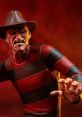 Freddy Krueger figure with signature striped sweater and hat, capturing his iconic horror movie presence.