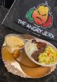 Delicious Caribbean dish from The Angry Jerk featuring savory meats, sides, and vibrant flavors on a decorative platter.