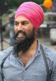 Jagmeet Singh The of "Jagmeet Singh" echoes through the crowded room, drawing the attention of all those present. The