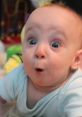 Baby with wide eyes and surprised expression, capturing the essence of joy and amazement, perfect for "SURPRISE BROOOOOOOOOOO.