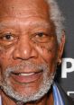 Morgan Freeman smiles warmly, showcasing his iconic features and gray beard at a recent event promoting his latest projects.