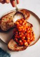 Beans on TOAST! The of a toaster popping up a perfectly crisp slice of bread fills the kitchen with a satisfying "ding!" as