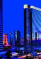 Stunning city skyline at dusk showcasing vibrant lights and modern architecture near Aria, Las Vegas.