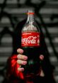 Coca_cola The iconic of a Coca-Cola can being opened is a tantalizing mix of anticipation and satisfaction. The crisp